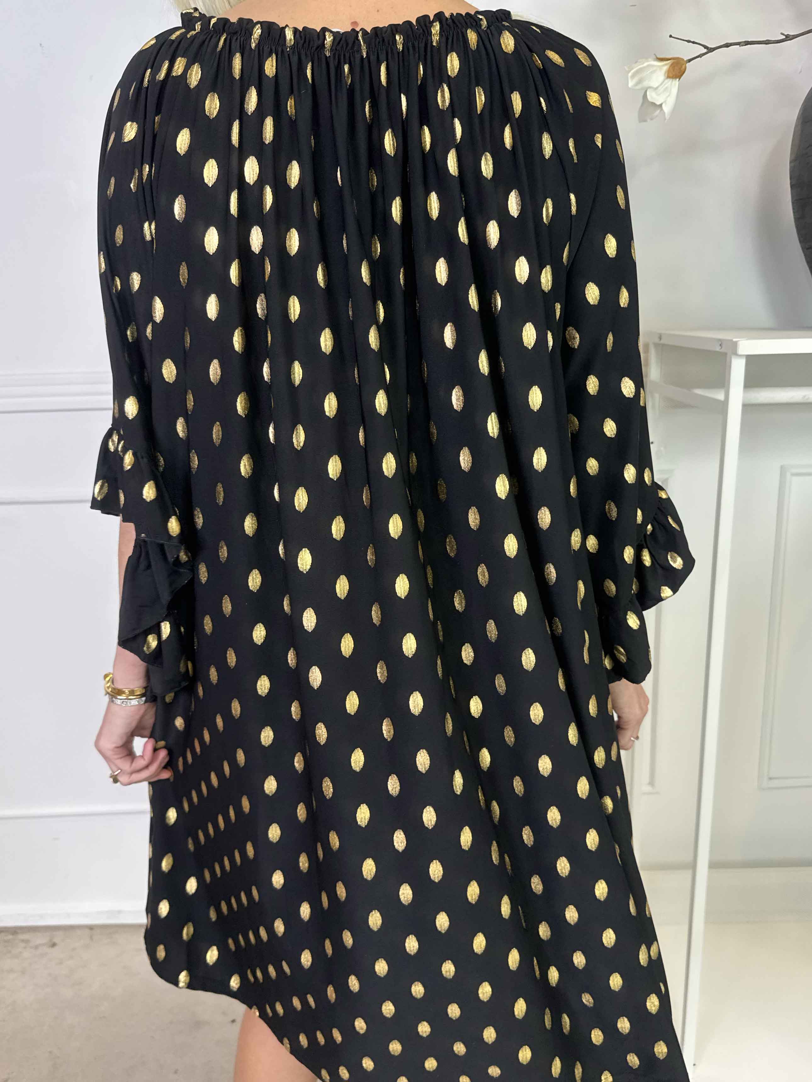 Yasma - Elastisk tunikaklänning med guldprickar och volangärmar